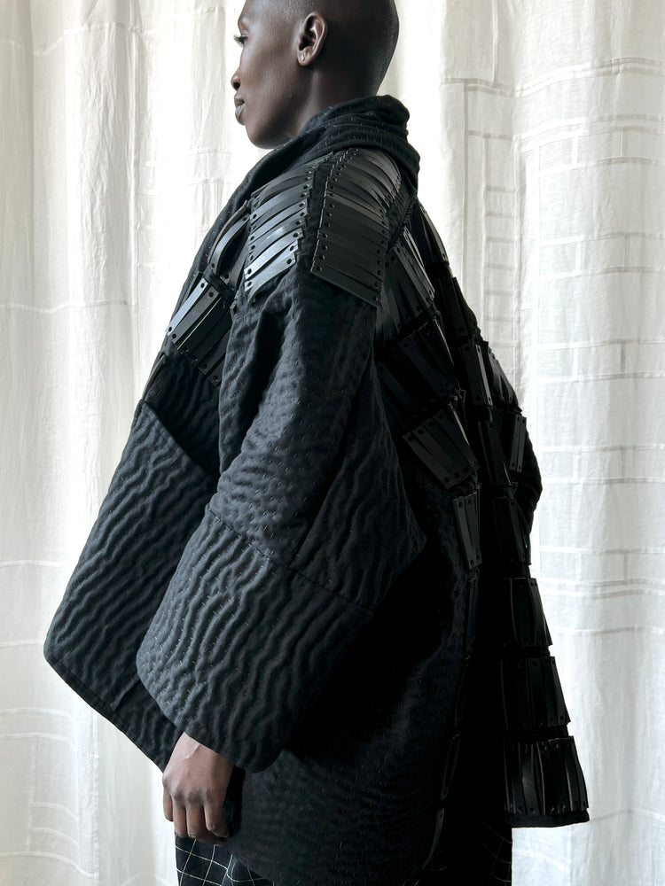 black quilted linen and leather jacket